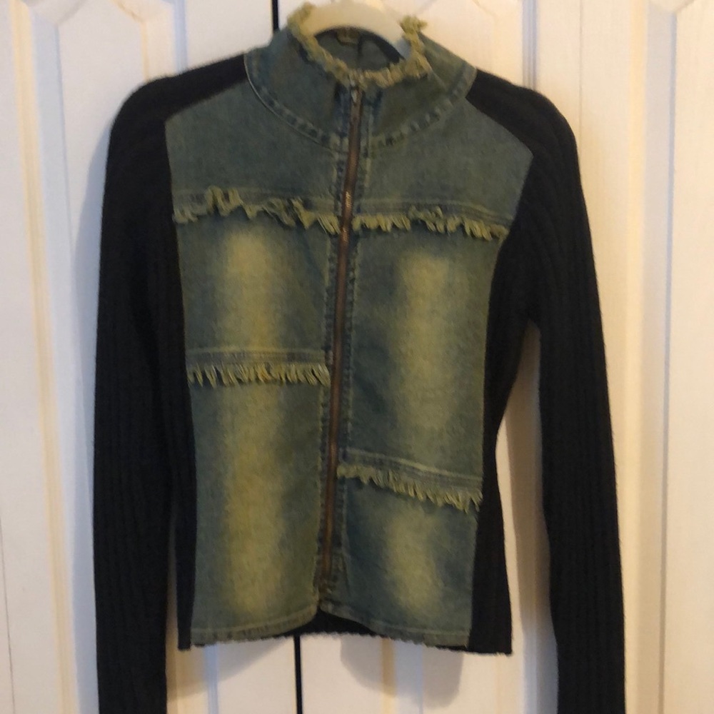 Cute jean jacket sweater, has zipper up the front with fringe design.